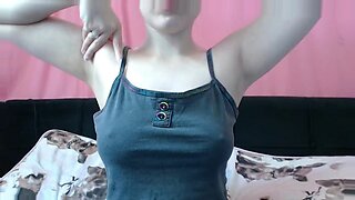 Teen girl indulges in sensual armpit massage in POV.